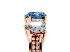 Fancy Blue Heart Cut Diamond Three-Stone Ring Set in Rose gold with Textured Band