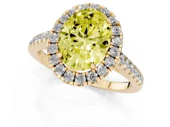 Fancy Yellow Oval Cut Diamond Halo Pavé Engagement Ring Set in Yellow gold with Prong Setting