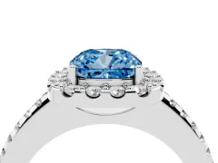 Fancy Blue Cushion Cut Diamond Pavé Halo Ring Set in Platinum with Prong Setting