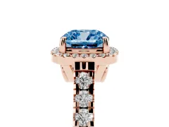 Fancy Blue Cushion Cut Diamond Halo Engagement Ring Set in Rose gold with Pavé Band and Prong-Set Center