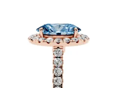Fancy Blue Oval Cut Diamond Halo Pavé Engagement Ring Set in Rose gold with Prong Setting
