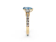 Fancy Blue Pear Cut Diamond Three-Stone Ring Set in Yellow gold with Round Side Stones and Delicate Pavé Band