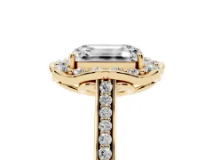 Emerald Cut Diamond Halo Ring Set in Yellow gold with Pavé-Lined Shoulders and Prong Setting