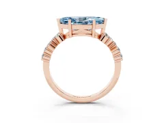Fancy Blue Marquise Cut Diamond Ring Set in Rose gold with Scattered Round Accents