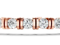 Round Brilliant Diamond Tennis Bracelet Set in Rose gold with Channel Set Stones and Box Clasp