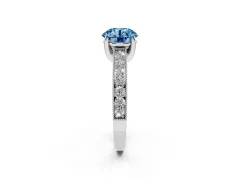 Fancy Blue Round Cut Diamond Solitaire Ring Set in Platinum with Milgrain-Edged Pavé Band and Prong Setting