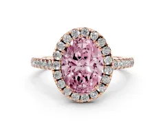 Fancy Pink Oval Cut Diamond Pavé Halo Engagement Ring Set in Rose gold with Pavé Band and Prong Setting