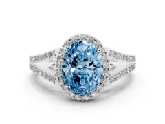 Fancy Blue Oval Cut Diamond Halo Split Shank Pavé Ring Set in White gold with Prong Setting
