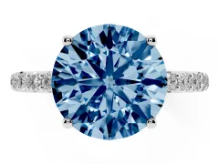 Fancy Blue Round Cut Diamond Solitaire Engagement Ring Set in Silver with Round Pavé Band and Prong Setting