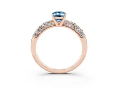 Fancy Blue Emerald Cut Diamond Pavé Band Solitaire Ring Set in Rose gold with Close-Set Accent Stones and Prong Setting