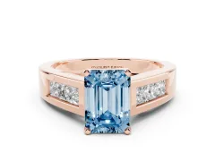 Fancy Blue Emerald Cut Diamond Solitaire Ring Set in Rose gold with Channel-Set Accent Stones and Prong Setting