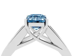 Fancy Blue Emerald Cut Diamond Solitaire Ring Set in Silver with Channel-Set Accent Stones and Prong Setting