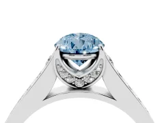 Fancy Blue Pear Cut Diamond Solitaire Pavé Engagement Ring Set in Platinum with Prong Setting