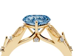 Fancy Blue Heart Cut Diamond Solitaire Ring Set in Yellow gold with Leaf Motif Band
