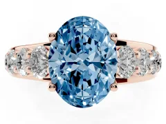 Fancy Blue Oval Cut Diamond Pavé Engagement Ring Set in Rose gold with Prong Setting