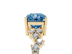 Fancy Blue Radiant Cut Diamond Ring Set in Yellow gold with Scattered Round Accents
