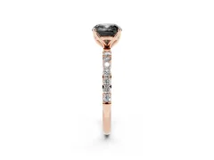 Fancy Black Cushion Cut Diamond Solitaire Engagement Ring Set in Rose gold with Round Pavé Band and Prong Setting
