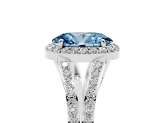 Fancy Blue Oval Cut Diamond Halo Split Shank Pavé Ring Set in Platinum with Prong Setting