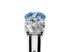 Fancy Blue Cushion Cut Diamond Three-Stone Ring Set in White gold with Plain Polished Band