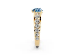 Fancy Blue Heart Cut Diamond Pavé Engagement Ring Set in Yellow gold with Prong Setting