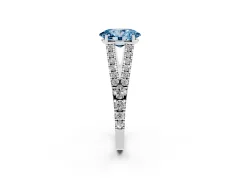 Fancy Blue Oval Cut Diamond Split Shank Pavé Engagement Ring Set in White gold with Prong-Held Center Stone
