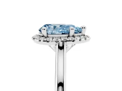 Fancy Blue Pear Cut Diamond Halo Engagement Ring Set in White gold with Pavé Band and Rising Shoulders