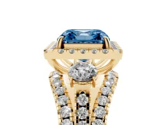Fancy Blue Asscher Cut Diamond Halo Split Shank Ring Set in Yellow gold with Round Accent Stones and Prong Setting