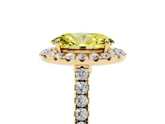 Fancy Yellow Oval Cut Diamond Halo Pavé Engagement Ring Set in Yellow gold with Prong Setting