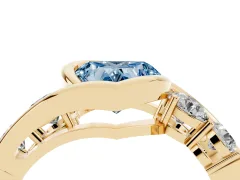 Fancy Blue Heart Cut Diamond Bezel Bypass Ring Set in Yellow gold with Round Accents