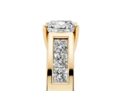 Cushion Cut Diamond Solitaire Ring Set in Yellow gold with Channel-Set Accent Stones and Prong Setting