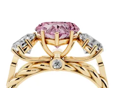 Fancy Pink Heart Cut Diamond Three-Stone Ring Set in Yellow gold with Braided Band