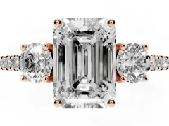Emerald Cut Diamond Three-Stone Ring Set in Rose gold with Pavé Band and Graduated Sides