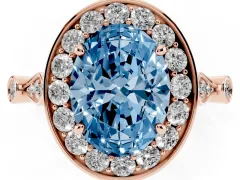 Fancy Blue Oval Cut Diamond Halo Engagement Ring Set in Rose gold with Twisted Band and Prong Setting