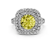 Fancy Yellow Round Cut Diamond Double Halo Ring Set in White gold with Pavé Split Shank and Prong Setting
