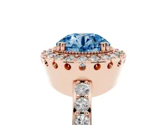 Fancy Blue Round Cut Diamond Halo Ring Set in Rose gold with Pavé Shank and Prong Setting