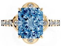 Fancy Blue Radiant Cut Diamond Solitaire Ring Set in Yellow gold with Pavé Band and Floral Prong Setting