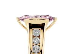 Fancy Pink Marquise Cut Diamond Bezel-Set Solitaire Ring Set in Yellow gold with Channel-Set Band