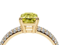 Fancy Yellow Emerald Cut Diamond Solitaire Ring Set in Yellow gold with Multi-Row Round Pavé Band and Prong Setting