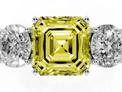 Fancy Yellow Asscher Cut Diamond Three-Stone Ring Set in White gold with Round Side Stones and Classic Band