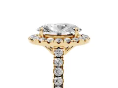 Oval Cut Diamond Pavé Halo Engagement Ring Set in Yellow gold with Pavé Band and Prong Setting