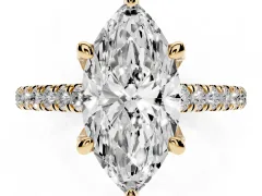 Marquise Cut Diamond Solitaire Ring Set in Yellow gold with Brilliant Pavé Band and Prong Setting