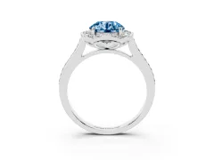 Fancy Blue Round Cut Diamond Halo Ring Set in Platinum with Pavé-Lined Shoulders and Prong Setting