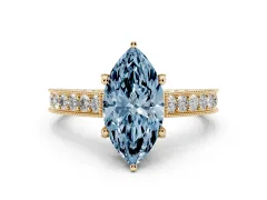 Fancy Blue Marquise Cut Diamond Solitaire Ring Set in Yellow gold with Milgrain-Edged Pavé Band and Prong Setting