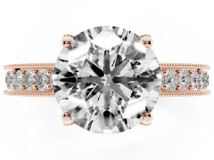 Round Cut Diamond Solitaire Ring Set in Rose gold with Milgrain-Edged Pavé Band and Prong Setting