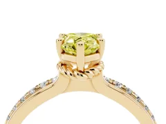 Fancy Yellow Pear Cut Diamond Solitaire Ring Set in Yellow gold with Channel Set Band and Prong Setting