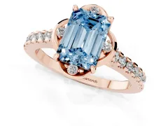 Fancy Blue Emerald Cut Diamond Solitaire Ring Set in Rose gold with Pavé Band and Floral Prong Setting