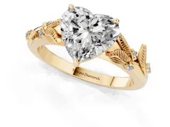 Heart Cut Diamond Solitaire Ring Set in Yellow gold with Leaf Motif Band