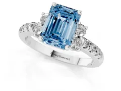 Fancy Blue Emerald Cut Diamond Three-Stone Pavé Ring Set in Silver with Prong Setting