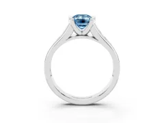 Fancy Blue Emerald Cut Diamond Bezel-Set Solitaire Ring Set in White gold with Channel-Set Band