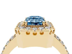 Fancy Blue Emerald Cut Diamond Halo Ring Set in Yellow gold with Pavé Shank and Prong Setting